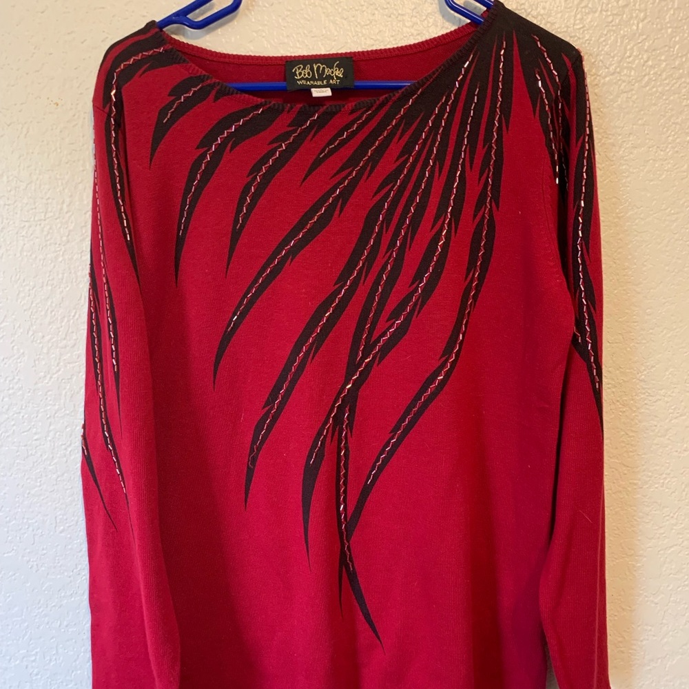 Bob Mackey Women’s Shirt-small with feathered earrings.